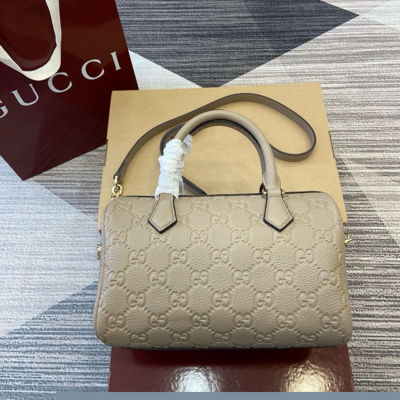 G*u*i top handle bags